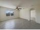 Bedroom with ample space, ceiling fan and view of the backyard at 944 Brooklet Dr, Davenport, FL 33837