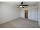 Bright carpeted bedroom with closet and ensuite bathroom at 944 Brooklet Dr, Davenport, FL 33837