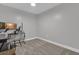 Cozy bedroom with carpet flooring, neutral paint and baseboards perfect for home office or guest room at 101 S Eola Dr # 509, Orlando, FL 32801