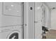 Well-equipped laundry area with washer and dryer units conveniently located near storage and access to more space at 101 S Eola Dr # 509, Orlando, FL 32801