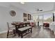 Open living space featuring a modern dining set and living room with lots of light at 101 S Eola Dr # 509, Orlando, FL 32801