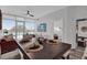 Open-concept living space with a dining table and a comfortable living room area at 101 S Eola Dr # 509, Orlando, FL 32801