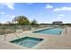 Rooftop pool and spa with lounge chairs and city views at 101 S Eola Dr # 509, Orlando, FL 32801