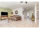 Spacious living area with modern decor, tile flooring, and open layout at 10339 Manila Bay Dr, Orlando, FL 32821