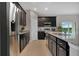 Well-equipped kitchen featuring stainless steel appliances and ample counter space at 1132 Clay Blvd, Tavares, FL 32778