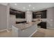 Modern kitchen with granite countertops, island and stainless steel appliances at 1132 Clay Blvd, Tavares, FL 32778