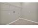 Laundry room with tile floor, wire shelving, and washer/dryer hookups at 1132 Clay Blvd, Tavares, FL 32778