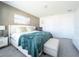 Spacious bedroom with plush carpeting, a comfortable king-sized bed, and ample natural light at 1217 Michelangelo Ln, Winter Haven, FL 33884