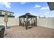 Backyard patio featuring a gazebo with seating, providing a cozy outdoor relaxation space at 1240 Lone Palm Way, St Cloud, FL 34771