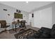 Spacious game room featuring a desk with a TV screen, gaming accessories, and comfortable seating for entertainment at 1240 Lone Palm Way, St Cloud, FL 34771