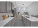 Spacious open kitchen featuring stainless steel appliances, and a large island at 1240 Lone Palm Way, St Cloud, FL 34771