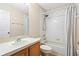 Bathroom features a vanity with a single sink, a toilet, and a shower/tub combination with a shower curtain at 1270 Falling Star Ln, Orlando, FL 32828