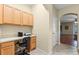 Home office space with built-in cabinets, a desk, and tile floors at 1270 Falling Star Ln, Orlando, FL 32828