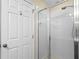 Well-lit shower with clear glass doors and chrome fixtures at 1270 Falling Star Ln, Orlando, FL 32828