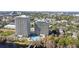 Aerial image of two condominium buildings, a pool, and the surrounding residential area at 13415 Blue Heron Beach Dr # 610, Orlando, FL 32821