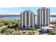 Stunning view of the waterfront condos with manicured lawns and parking at 13415 Blue Heron Beach Dr # 610, Orlando, FL 32821