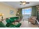 Well-appointed living room with plush seating and a scenic view from the sliding doors at 13415 Blue Heron Beach Dr # 610, Orlando, FL 32821