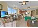Inviting living area with a dining space, and an open layout to the kitchen at 13415 Blue Heron Beach Dr # 610, Orlando, FL 32821