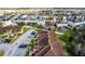 An aerial view of the community highlighting the neighborhood's layout, green spaces, and proximity to other residences at 13801 Timberland Dr # 202, Orlando, FL 32824