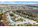 A panoramic aerial shot showcases community's layout, green spaces, and closeness to neighborhood at 13801 Timberland Dr # 202, Orlando, FL 32824