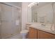 Clean bathroom showcasing a shower with a glass enclosure and a single sink vanity at 13801 Timberland Dr # 202, Orlando, FL 32824