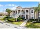 Inviting condo complex features stairs leading to the front doors and well-maintained landscaping at 13801 Timberland Dr # 202, Orlando, FL 32824