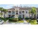Well-maintained condo with a tile roof, manicured landscaping, and reserved parking at 13801 Timberland Dr # 202, Orlando, FL 32824