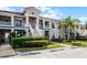 Charming townhome featuring two stories, well-maintained landscaping, and reserved parking, creating a welcoming atmosphere at 13801 Timberland Dr # 202, Orlando, FL 32824