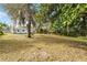 The spacious backyard offers a large area and scenic views at 144 Delespine Dr, Debary, FL 32713