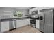 Modern kitchen featuring stainless steel appliances and ample countertop space at 144 Delespine Dr, Debary, FL 32713