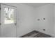 A laundry room area features hookups and an exterior door with an outside view at 144 Delespine Dr, Debary, FL 32713