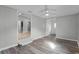 Bright living room with views into other rooms. Natural light floods through windows and doors at 144 Delespine Dr, Debary, FL 32713