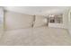 Open-concept living area with tile floors seamlessly connects to the kitchen at 15088 Night Heron Dr, Winter Garden, FL 34787
