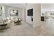 Inviting living room with tile floors, recessed lighting, and an open floor plan at 15088 Night Heron Dr, Winter Garden, FL 34787
