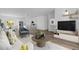 A living room flows into an open-concept kitchen and dining area, perfect for entertaining at 166 Marion Oaks Ln, Ocala, FL 34473