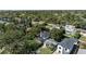 Aerial view of a residential neighborhood with lush trees and well-maintained homes at 1701 Clouser Ave, Orlando, FL 32804