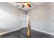 Bedroom featuring dark wood flooring, a ceiling fan, and a neutral color palette at 1859 Britlyn Aly, Orlando, FL 32814