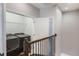 Second floor laundry room featuring washer, dryer and storage shelves at 1859 Britlyn Aly, Orlando, FL 32814