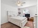 Inviting bedroom with a queen-sized bed, soft carpet, and a window providing natural light at 2413 Tack Room Ln # 2, Orlando, FL 32812