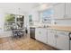 Cozy eat-in kitchen area with a view of the yard and neutral finishes at 2413 Tack Room Ln # 2, Orlando, FL 32812