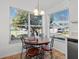 Bright eat-in kitchen featuring a dining set and bright natural light at 2413 Tack Room Ln # 2, Orlando, FL 32812