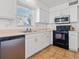 Efficient kitchen with stainless steel dishwasher and black appliances at 2413 Tack Room Ln # 2, Orlando, FL 32812