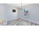 Well-lit dining room with a view outside the window at 2491 Bracknell Forest Trl, Tavares, FL 32778