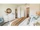 Comfortable bedroom with neutral tones, offering a relaxing atmosphere and stylish decorative accents at 2568 Kinsale Ln, Ormond Beach, FL 32174