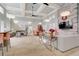 Spacious clubhouse with elegant decor, comfortable seating, and a cozy ambiance for community events at 3128 Dark Sky Dr, Harmony, FL 34773