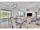 Bright dining room with sliding glass doors opens to the outdoor space and backyard at 3128 Dark Sky Dr, Harmony, FL 34773