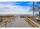 Scenic community dock offering tranquil water views and opportunities for boating and water activities at 3128 Dark Sky Dr, Harmony, FL 34773