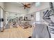 Bright gym featuring treadmills, bikes, and mirrored wall reflecting fitness equipment at 3128 Dark Sky Dr, Harmony, FL 34773