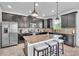 Well-appointed kitchen with stainless steel appliances, granite countertops, and ample cabinet space at 3128 Dark Sky Dr, Harmony, FL 34773