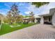 Charming outdoor seating area with well manicured lawn, perfect for dining and socializing at 3128 Dark Sky Dr, Harmony, FL 34773
